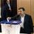 President Ahmadinejad votes in Majlis elections